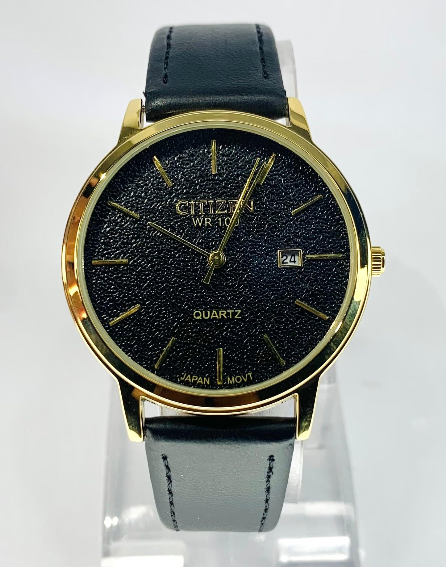 Citizen - Quartz watch with a Black Leather Band And Gold Toned Case